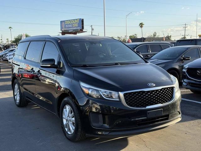 Photo of 2017 Aurora Black Kia Sedona