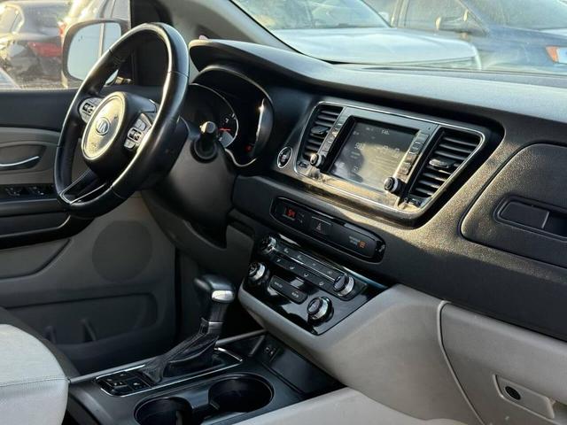 Photo of 2017 Aurora Black Kia Sedona