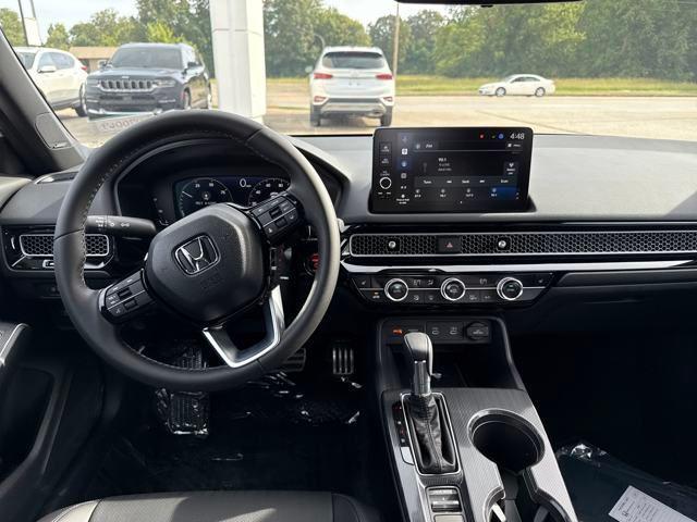 Photo of 2026 Platinum White Pearl Honda Civic Hybrid