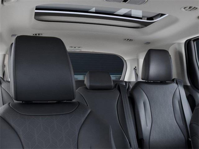 Photo of 2025 Snow White Pearl Kia Carnival Hybrid