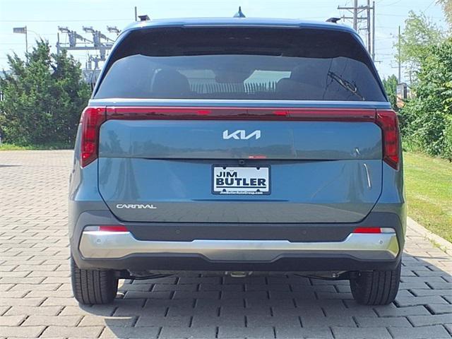Photo of 2025 Astra Blue Kia Carnival