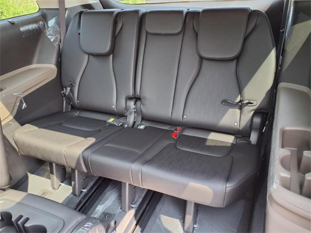 Photo of 2025 Astra Blue Kia Carnival