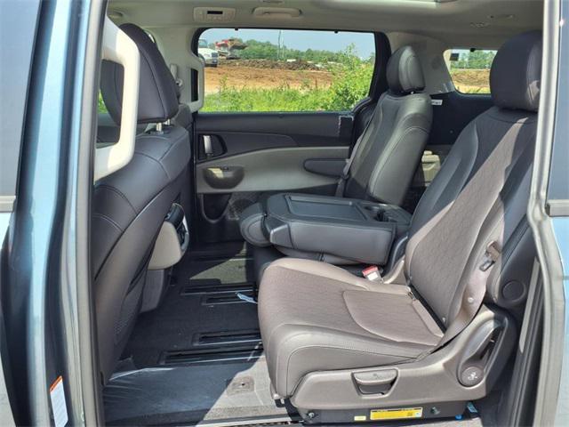 Photo of 2025 Astra Blue Kia Carnival