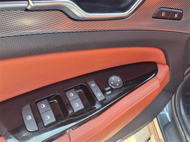 Photo of 2025 Gravity Gray Kia Sportage Hybrid