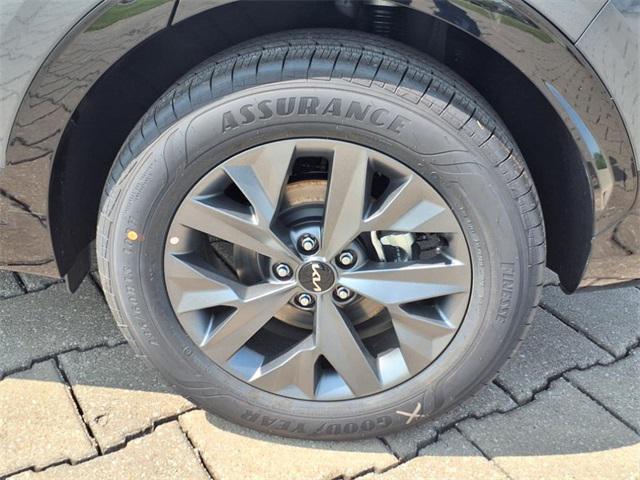 Photo of 2025 Gravity Gray Kia Sportage Hybrid