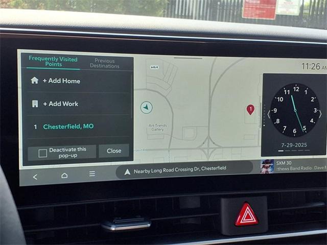 Photo of 2026 Snow White Pearl Kia Carnival Hybrid