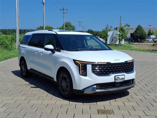 Photo of 2026 Snow White Pearl Kia Carnival Hybrid