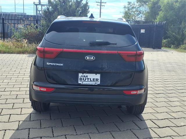 Photo of 2019 Black Cherry Kia Sportage