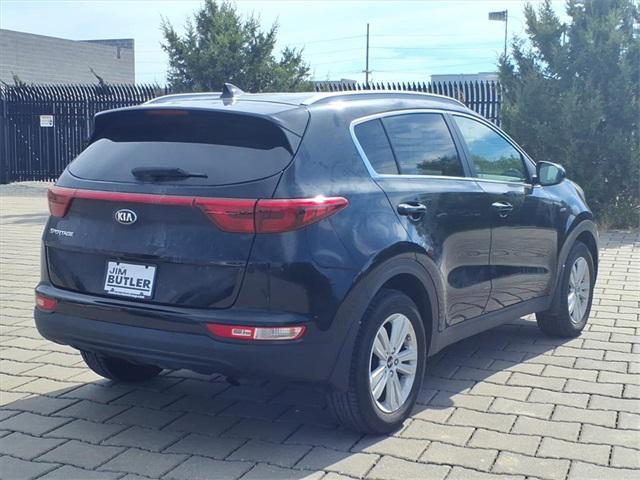 Photo of 2019 Black Cherry Kia Sportage