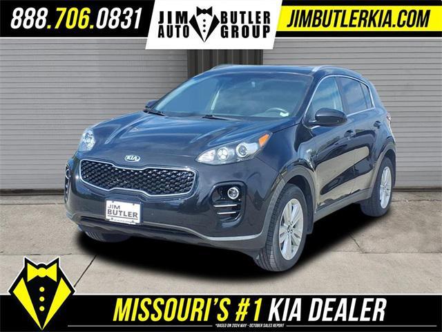 Photo of 2019 Black Cherry Kia Sportage