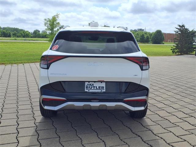 Photo of 2025 Snow White Pearl Kia Sportage Hybrid