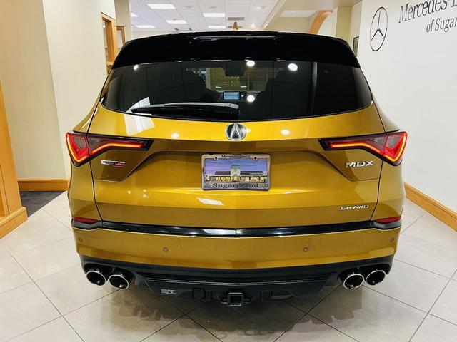 Photo of 2022 Tiger Eye Pearl Acura MDX