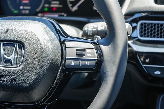 Photo of 2026 Platinum White Pearl Honda Civic Hybrid