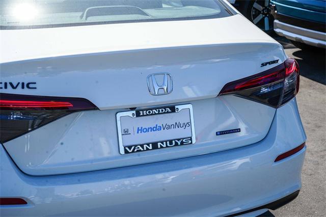 Photo of 2026 Platinum White Pearl Honda Civic Hybrid