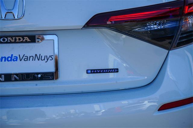 Photo of 2026 Platinum White Pearl Honda Civic Hybrid