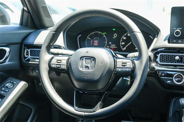 Photo of 2026 Platinum White Pearl Honda Civic Hybrid