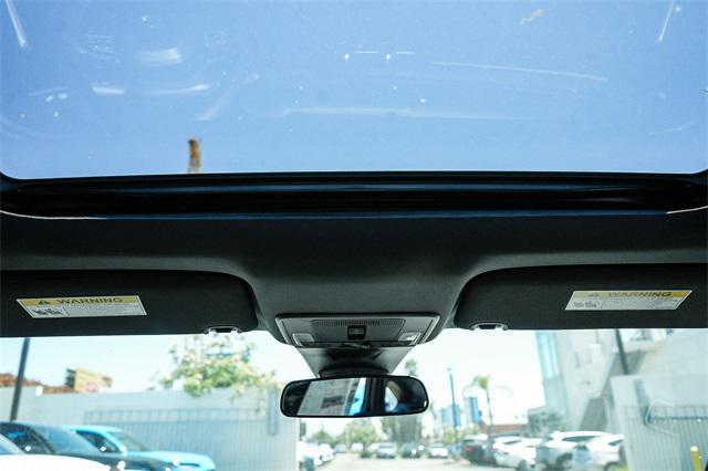 Photo of 2026 Platinum White Pearl Honda Civic Hybrid