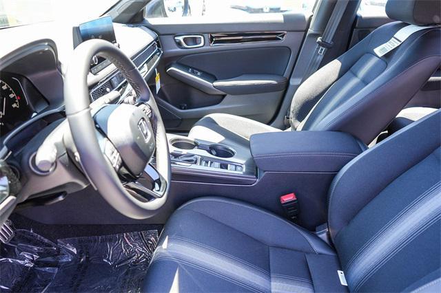 Photo of 2026 Platinum White Pearl Honda Civic Hybrid