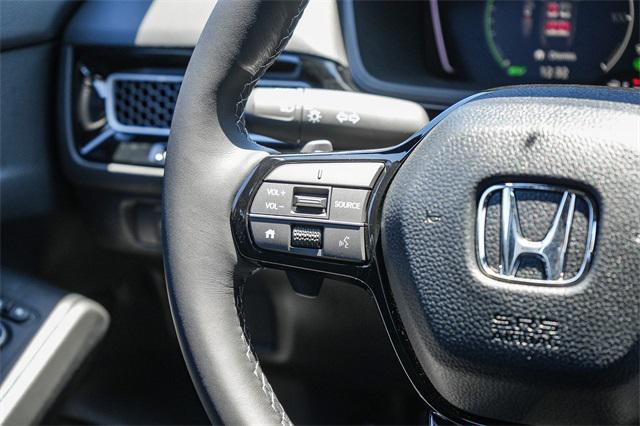 Photo of 2026 Platinum White Pearl Honda Civic Hybrid