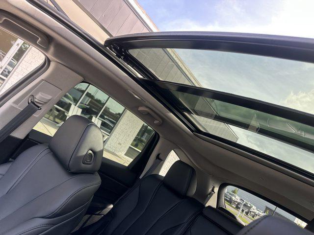 Photo of 2024 Liquid Carbon Metallic Acura MDX