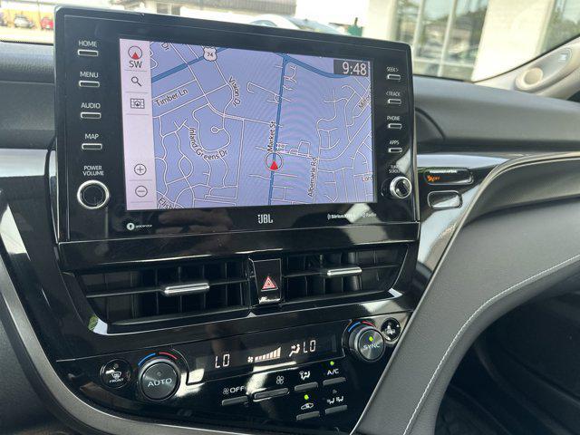 Photo of 2024 White Toyota Camry Hybrid