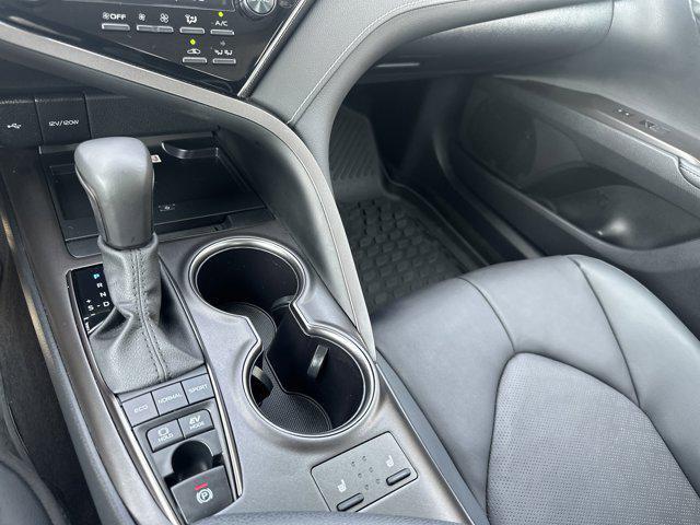 Photo of 2024 White Toyota Camry Hybrid