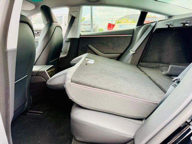 Photo of 2025 Black Tesla Model 3