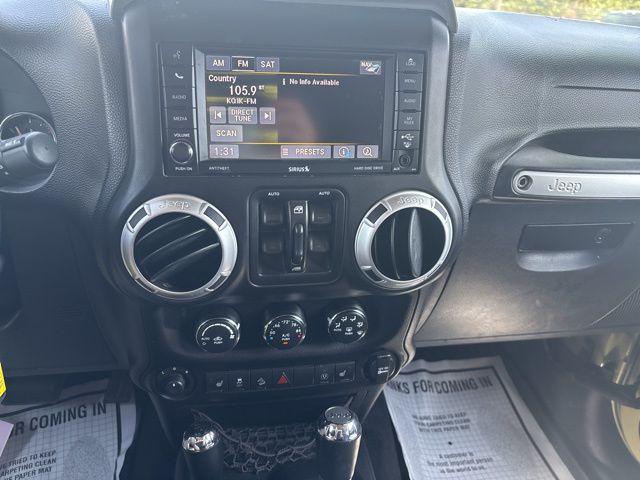 Photo of 2013 Commando Green Jeep Wrangler Unlimited