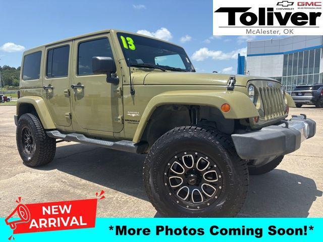 Photo of 2013 Commando Green Jeep Wrangler Unlimited