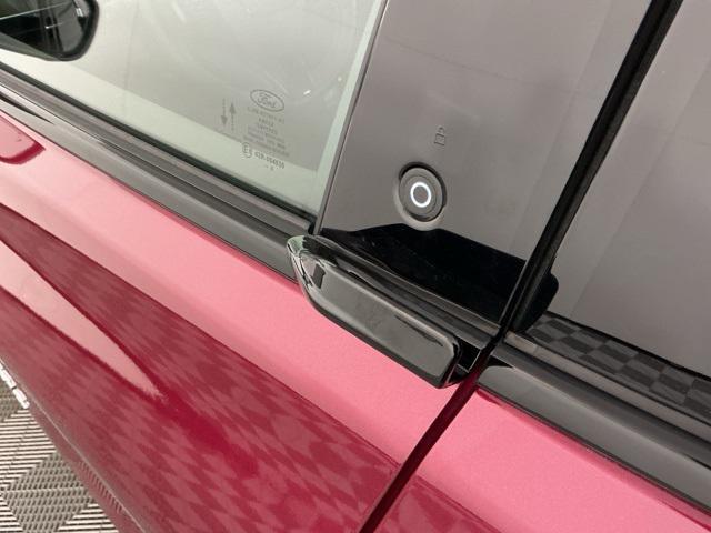 Photo of 2025 Molten Magenta Metallic Tinted Clearcoat Ford Mustang Mach-E