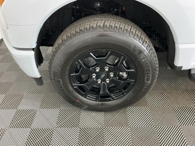 Photo of 2025 Space White Metallic Ford F-150 Lightning