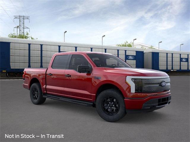 Photo of 2025 Rapid Red Metallic Tinted Clearcoat Ford F-150 Lightning