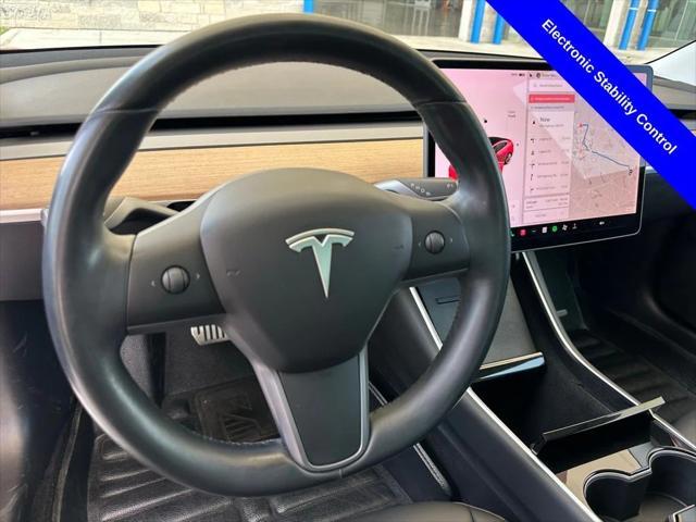 Photo of 2019 Red Multi-Coat Tesla Model 3