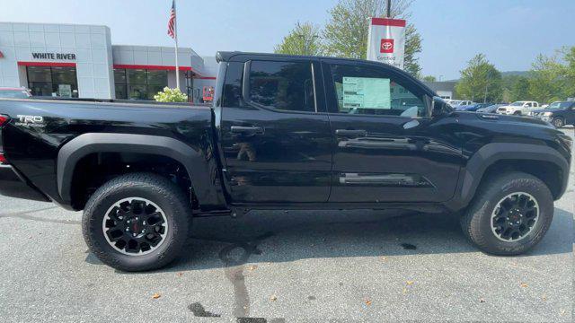 Photo of 2025 Black Toyota Tacoma