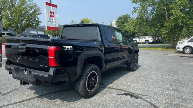 Photo of 2025 Black Toyota Tacoma