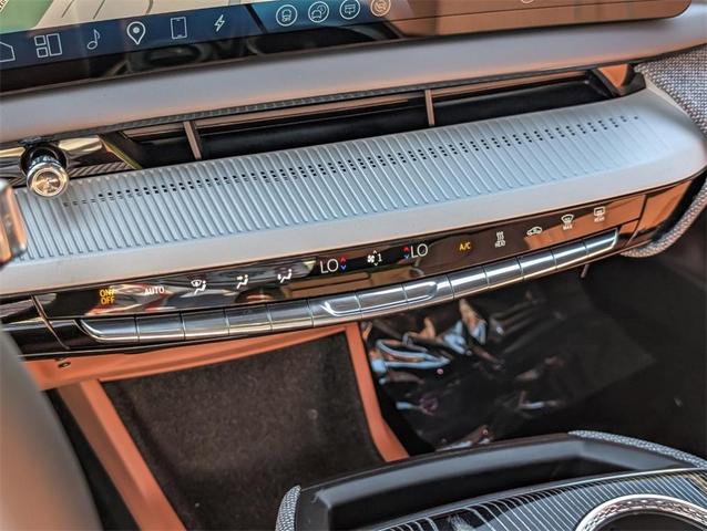 Photo of 2025 Crystal White Tri-Coat Cadillac OPTIQ
