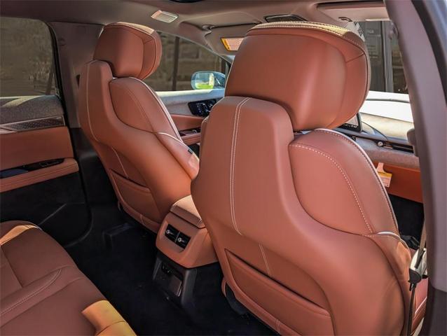 Photo of 2025 Crystal White Tri-Coat Cadillac OPTIQ