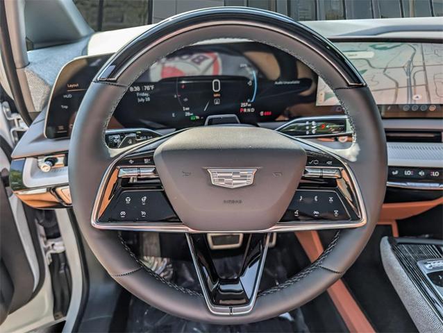 Photo of 2025 Crystal White Tri-Coat Cadillac OPTIQ