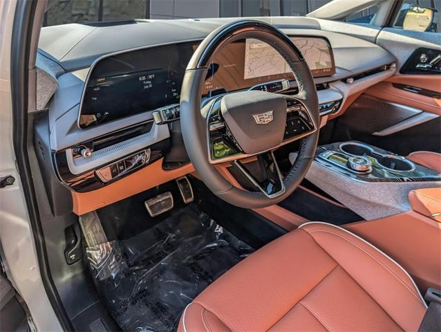 Photo of 2025 Crystal White Tri-Coat Cadillac OPTIQ
