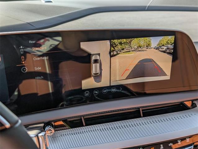 Photo of 2025 Crystal White Tri-Coat Cadillac OPTIQ