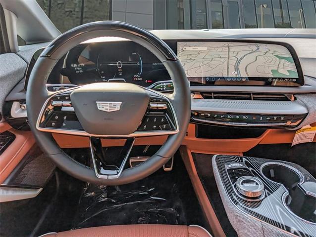 Photo of 2025 Crystal White Tri-Coat Cadillac OPTIQ