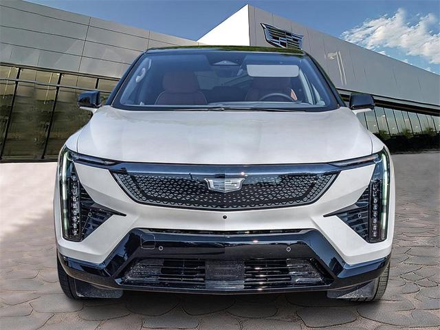 Photo of 2025 Crystal White Tri-Coat Cadillac OPTIQ