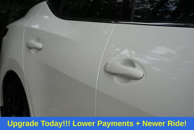 Photo of 2023 Pearl White Tricoat Nissan Maxima