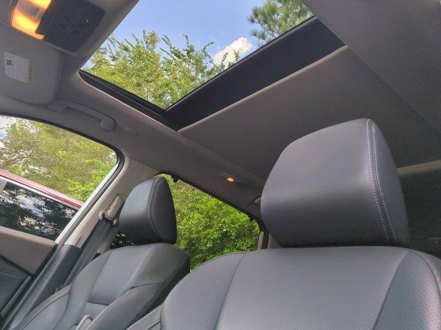 Photo of 2023 Champagne Silver Nissan Rogue