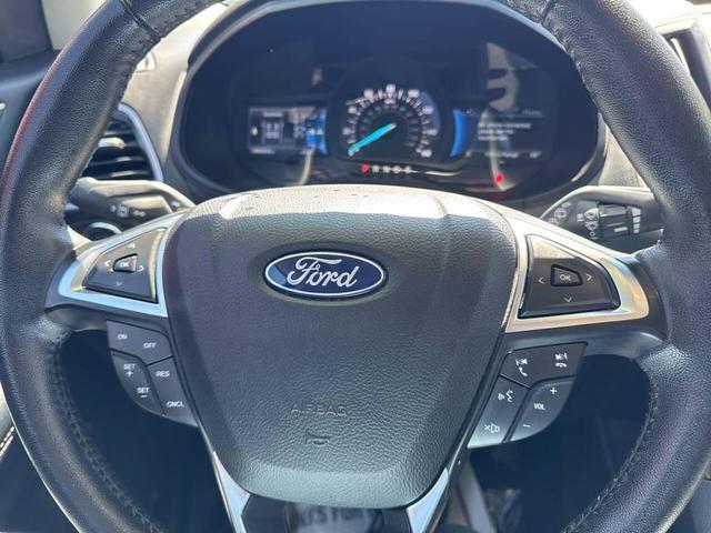 Photo of 2024 Agate Black Metallic Ford Edge