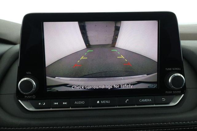 Photo of 2023 Pearl White Tricoat Nissan Rogue