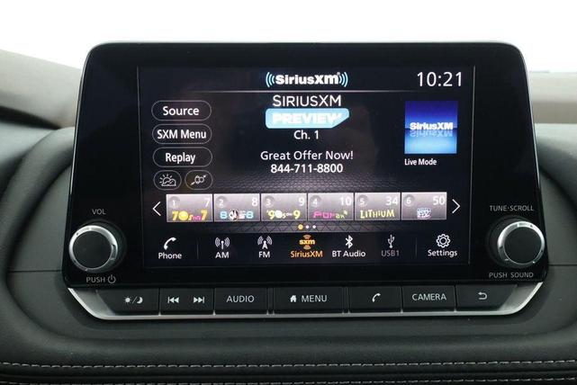 Photo of 2023 Pearl White Tricoat Nissan Rogue