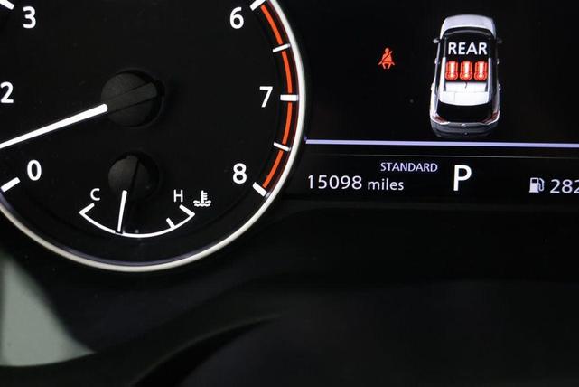 Photo of 2023 Pearl White Tricoat Nissan Rogue