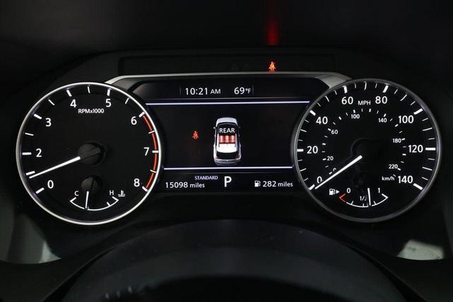 Photo of 2023 Pearl White Tricoat Nissan Rogue