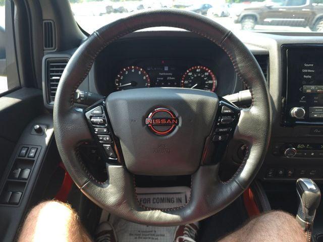 Photo of 2023 Tactical Green Metallic Nissan Frontier